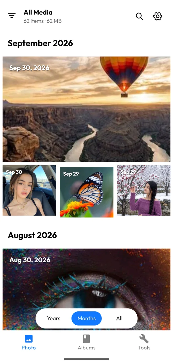 Photo timeline grouped by month with large highlight images